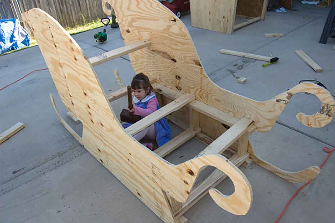 The Santa Sleigh framing inside view, complete with Ashleigh "helping" me build. 