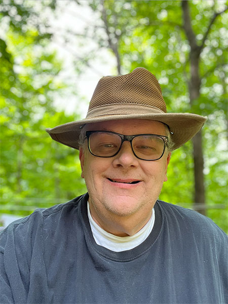 Donald J. Claxton | The Timberlander, a selfie from camping for 13 weeks in 2022 on the Claxton family land in the Upper Peninsula of Michigan, northwest of Marquette.